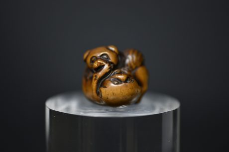 netsuke dogs playing